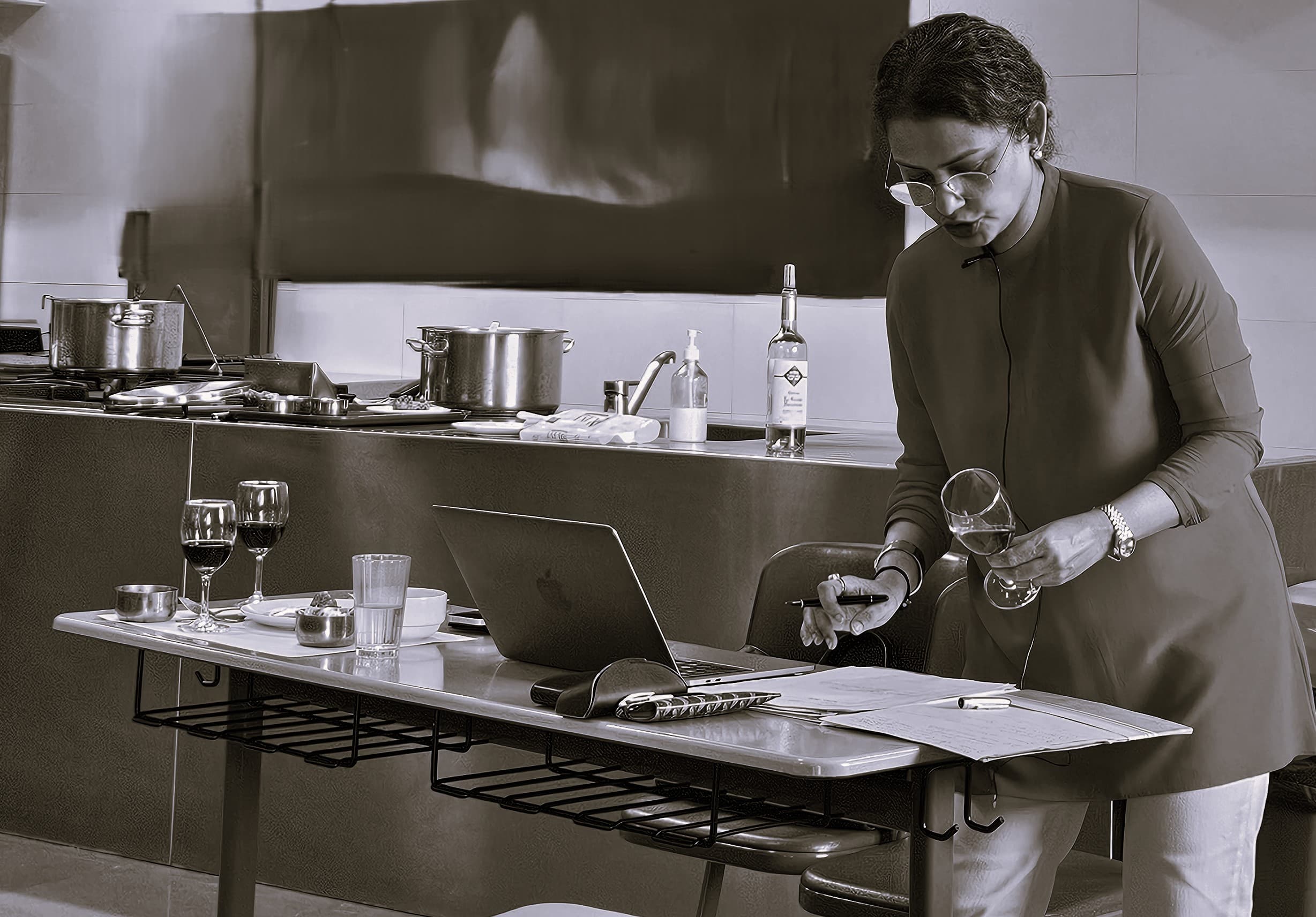 Mata reviewing tasting notes during a wine session